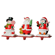 Load image into Gallery viewer, 6.5&quot;H Resin Santa, Snowman, Penguin Stocking Holders, Set of 3
