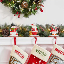 Load image into Gallery viewer, 6.5&quot;H Resin Santa, Snowman, Penguin Stocking Holders, Set of 3
